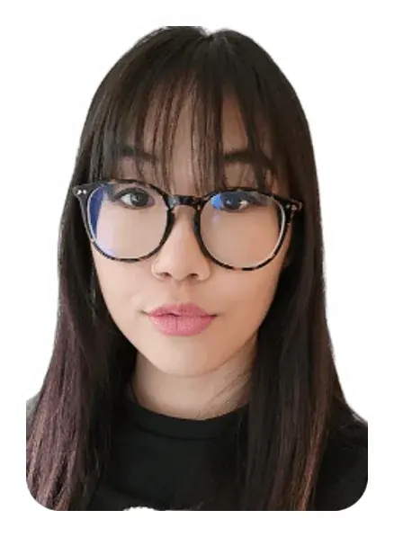 Portrait of Talia in round tortoiseshell glasses